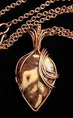 teardrop marbled jasper pendant with epaulette copper wrap